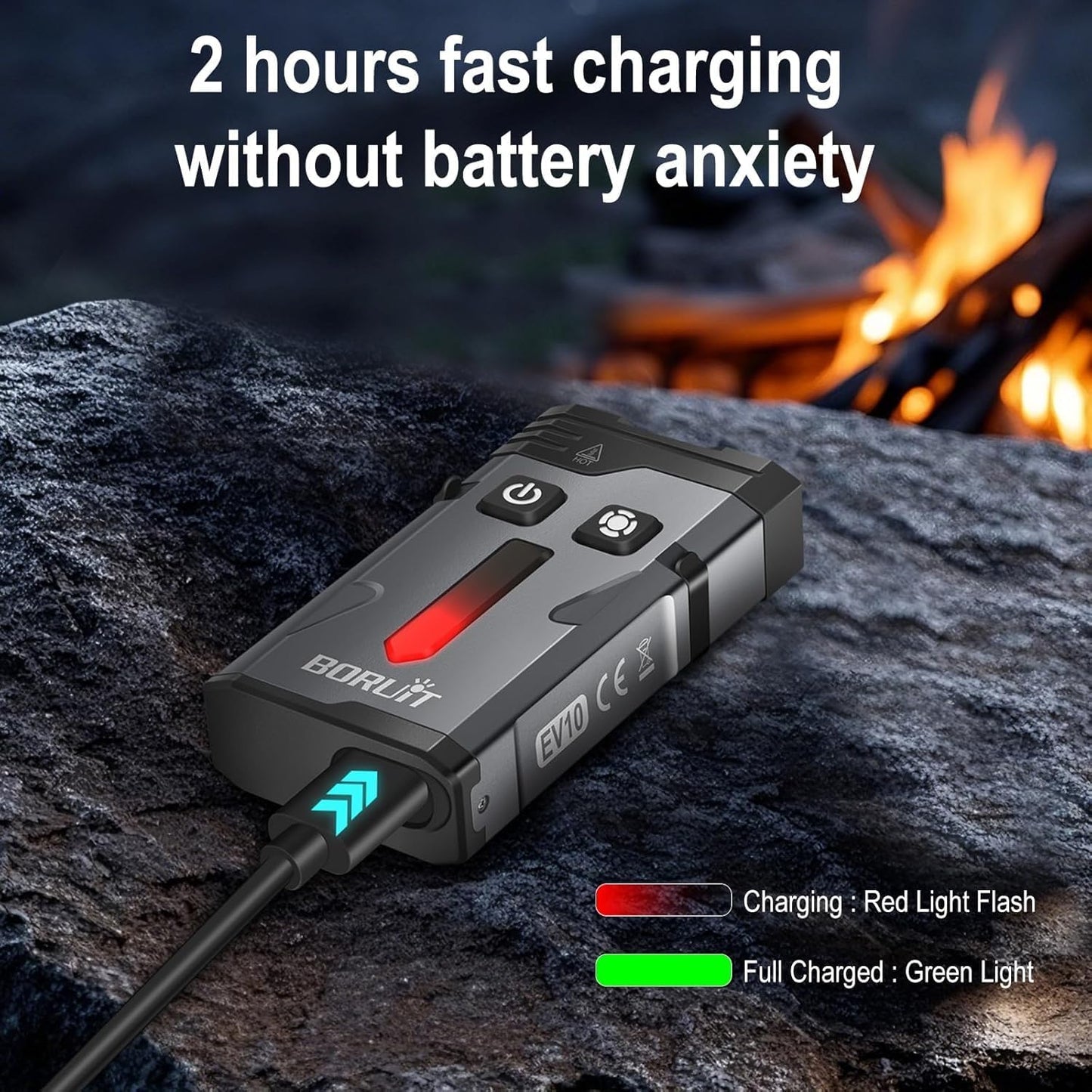 APEX Online SA compact magnetic flashlight charging with a USB-C cable on a rocky outdoor surface near a campfire